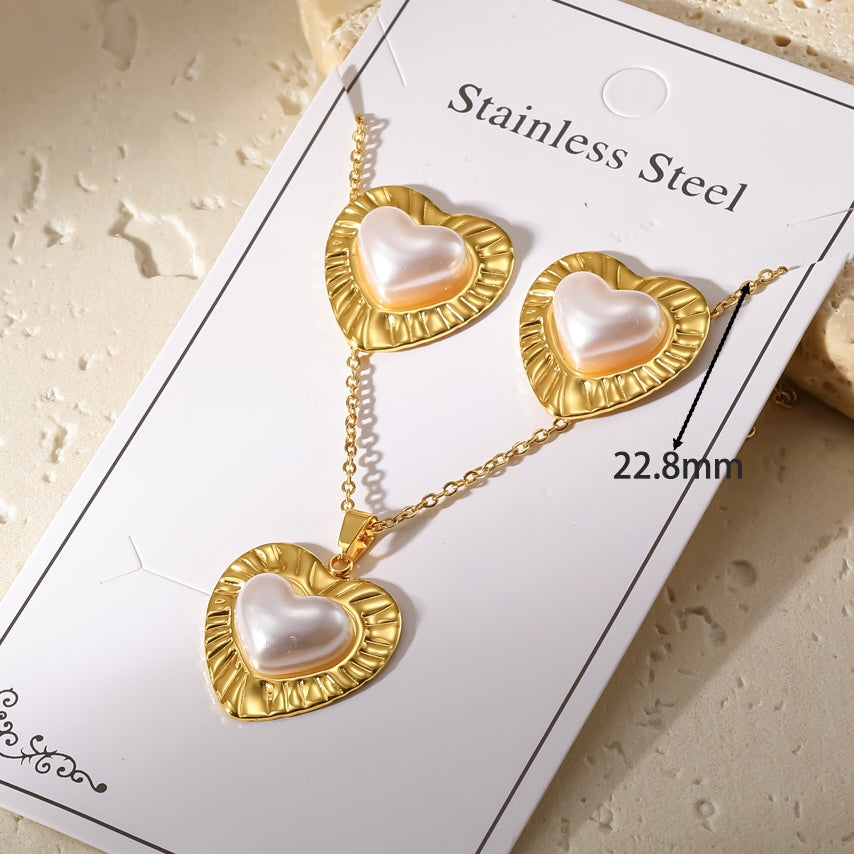 Set de collar+aretes corazones- acero inoxidable
