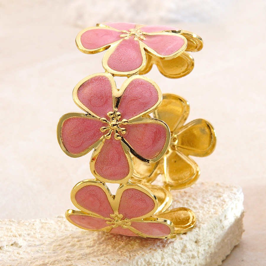 Brazalete ajustable flores rosadas- acero inoxidable