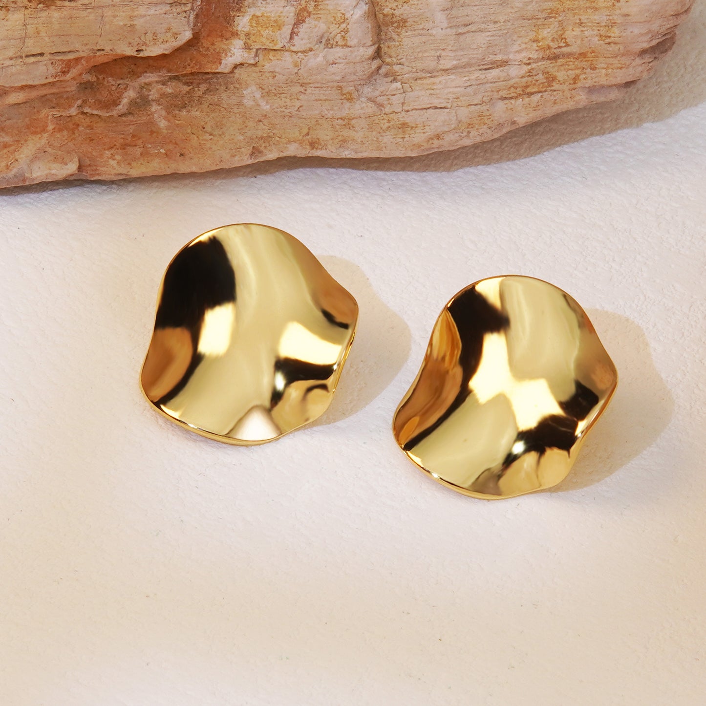Aretes circulares con textura- acero inoxidable