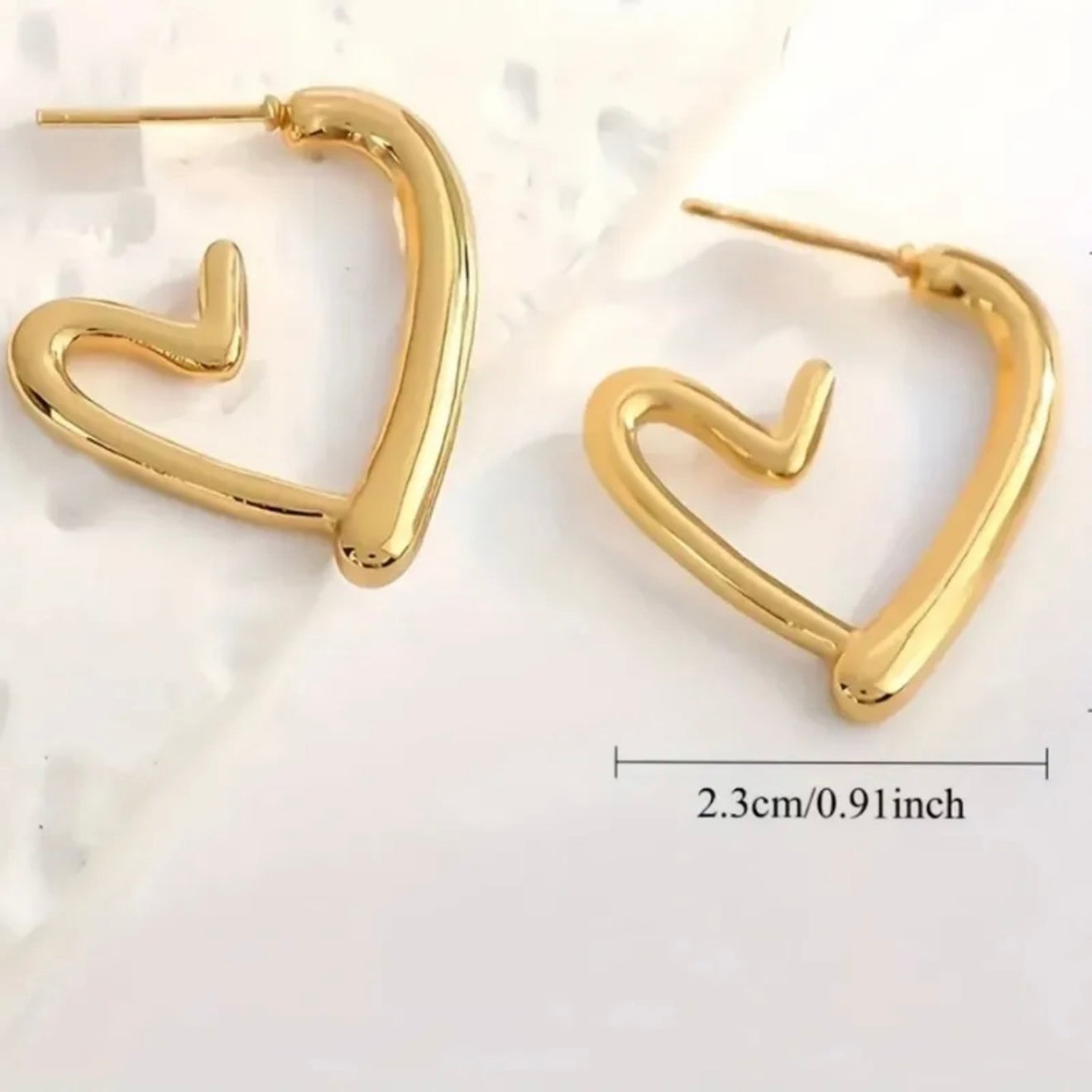 Aretes corazones dorados- acero inoxidable