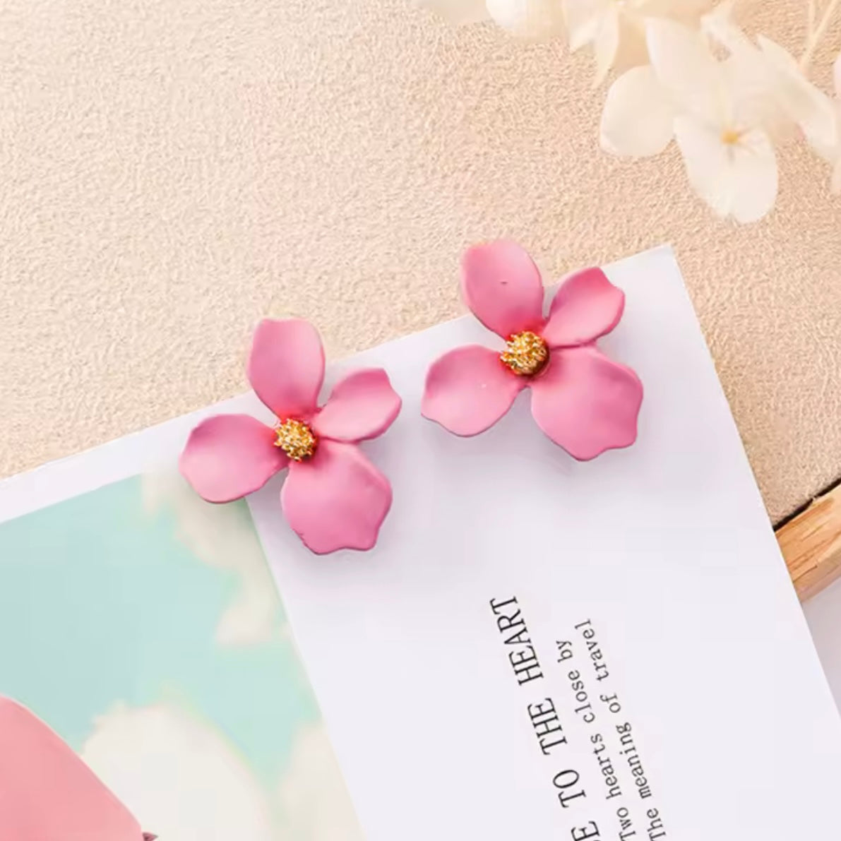 Aretes de florecitas rosa bajito