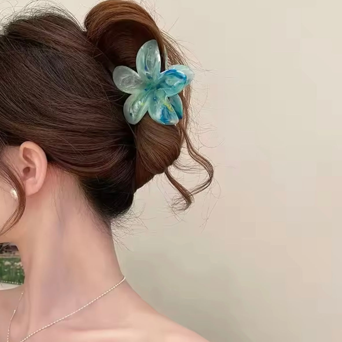 Pinza de flor azul-verde