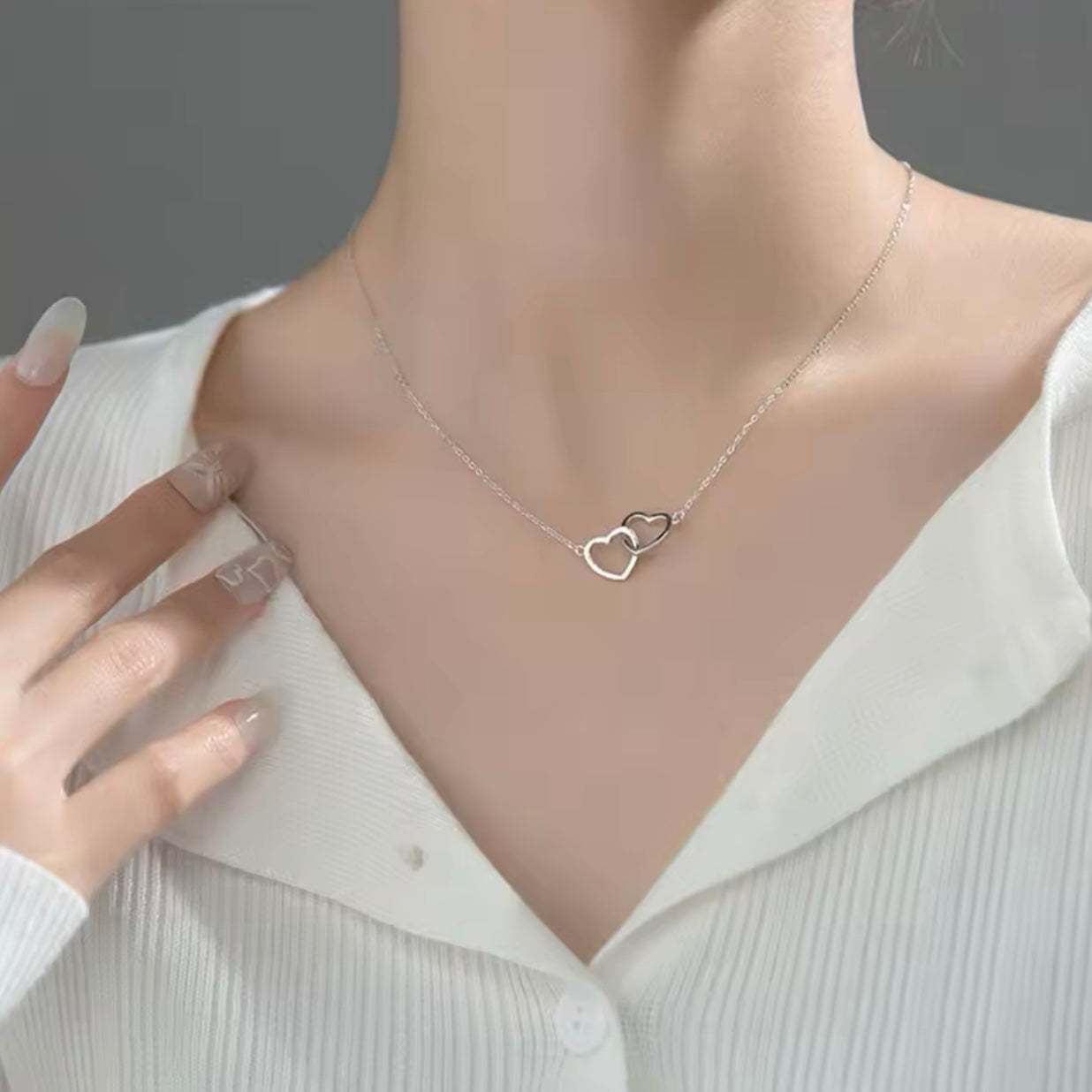 Collar de corazones entrelazados - acero inoxidable