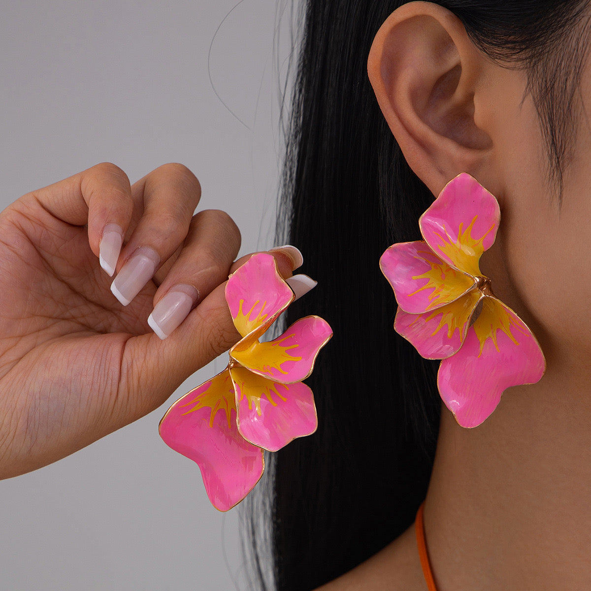 Aretes de flores hawaianas rosadas