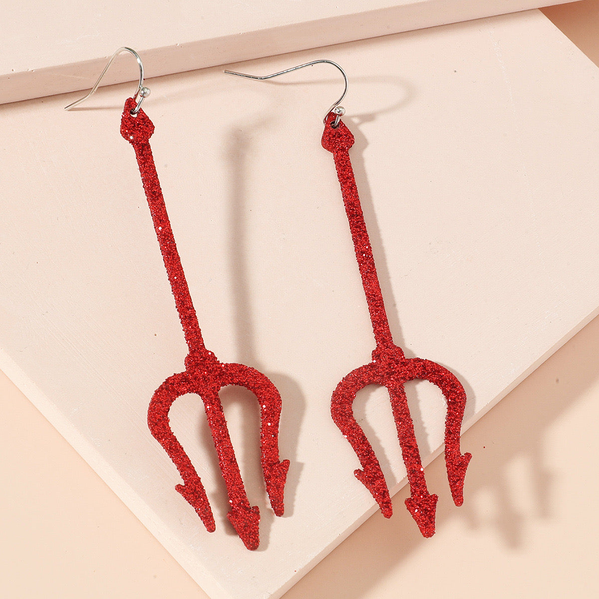 Aretes largos de tridentes con diamantina