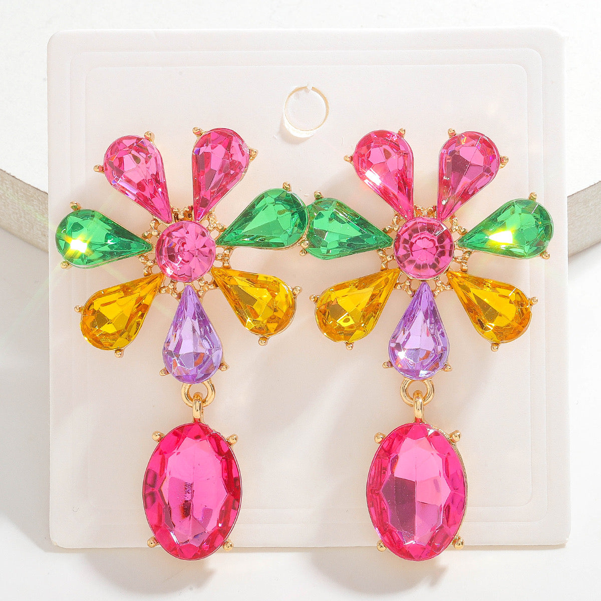 Aretes de pedrería en forma de flor
