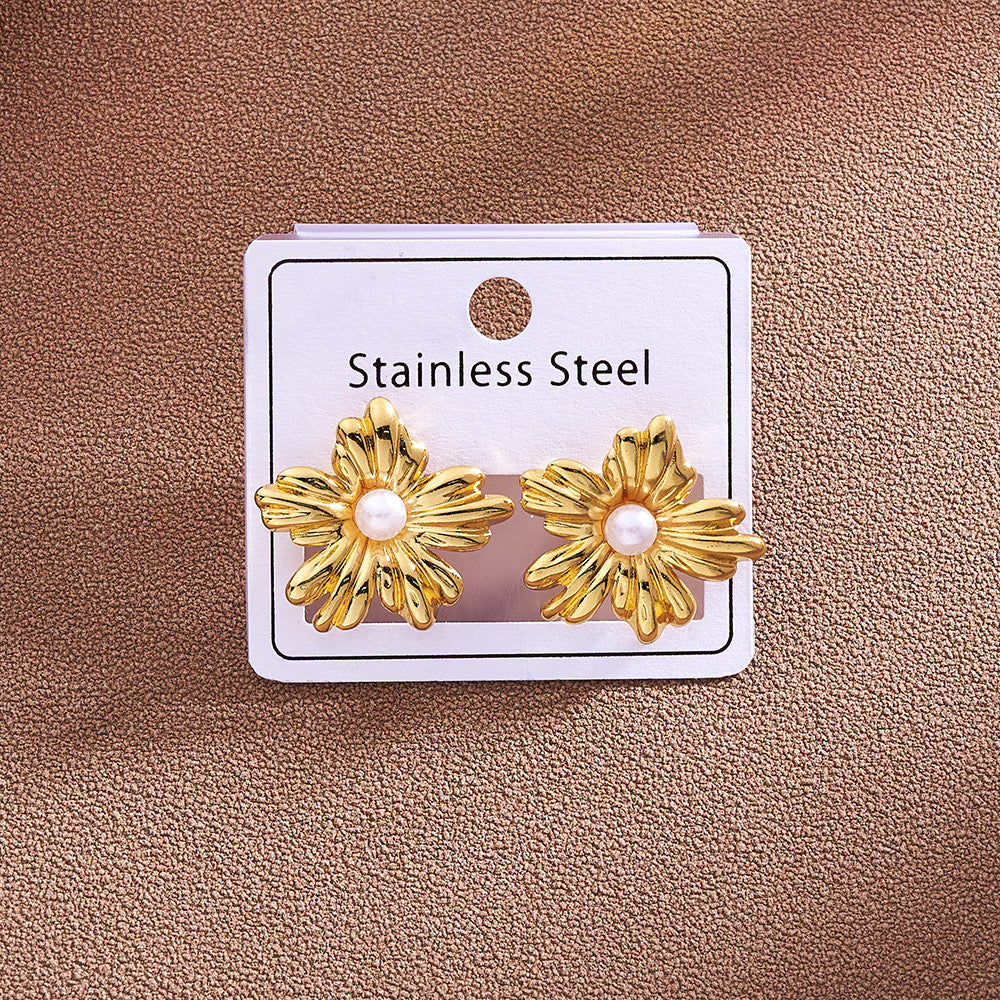 Aretes florecitas doradas con perlita blanca- acero inoxidable