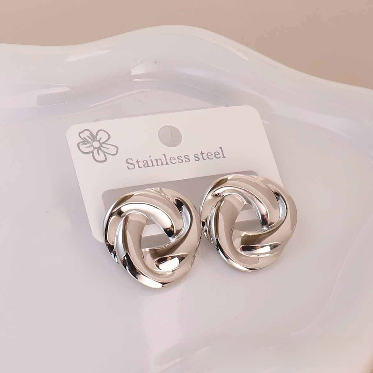 Aretes circulares plateados - acero inoxidable
