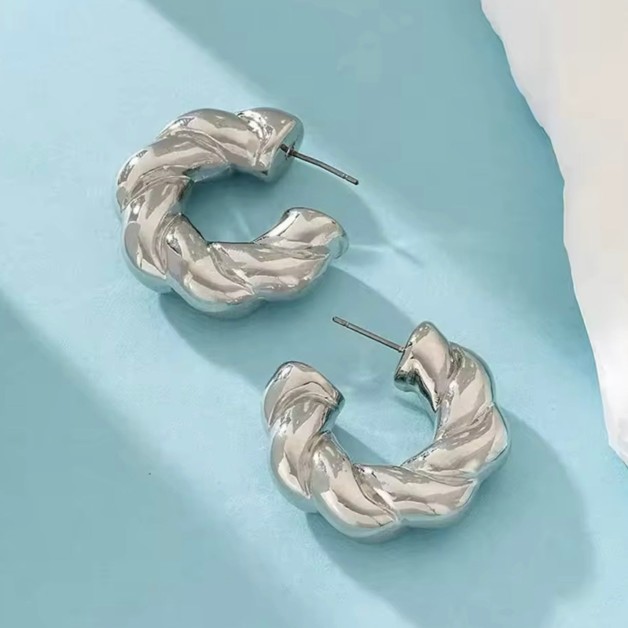 Aretes espiral plateados