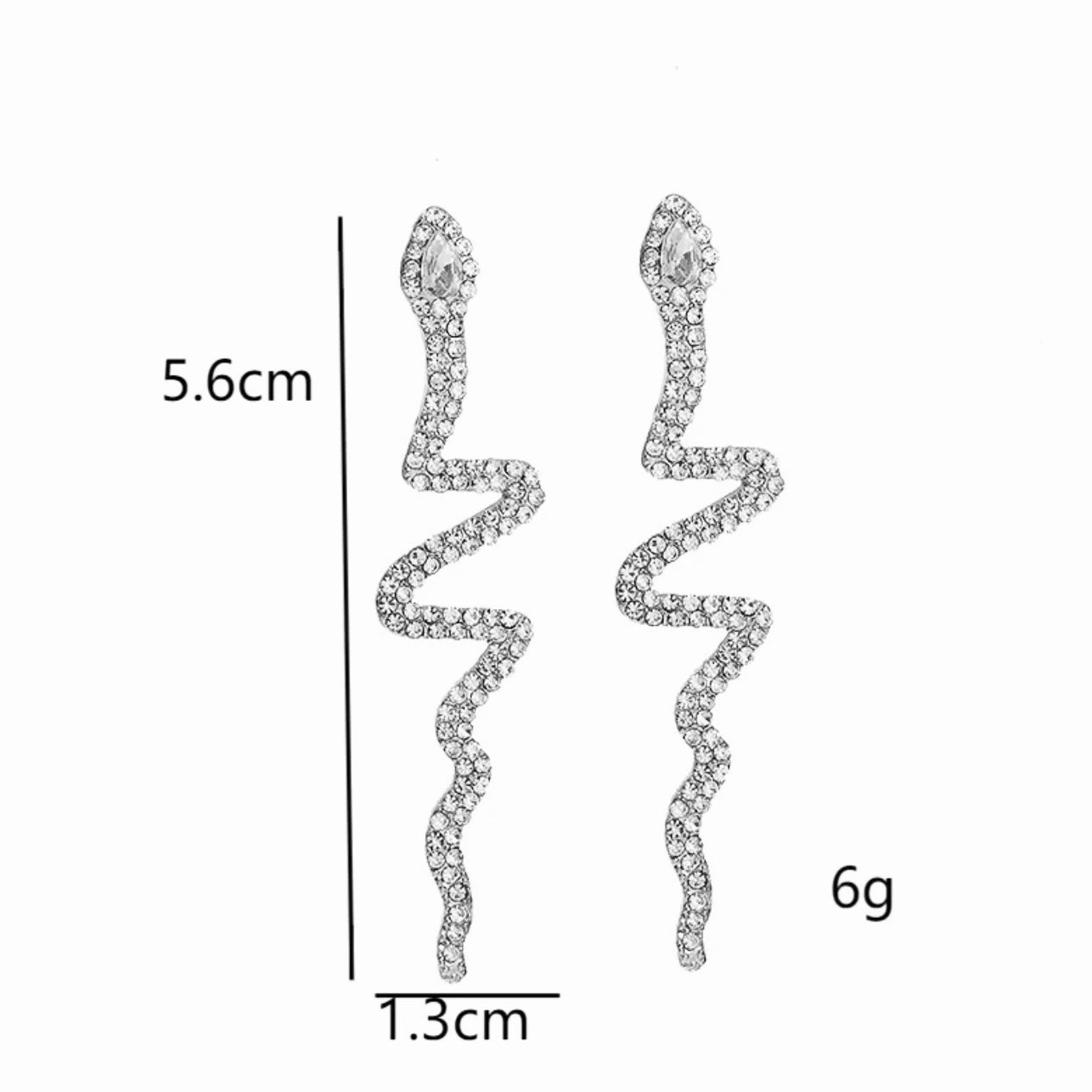 Aretes de serpientes doradas con pedrería plateada