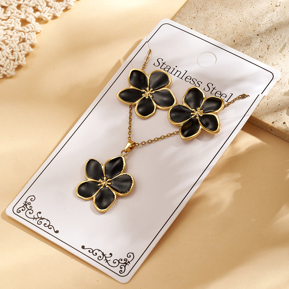 Set de collar + aretes flores negras - acero inoxidable