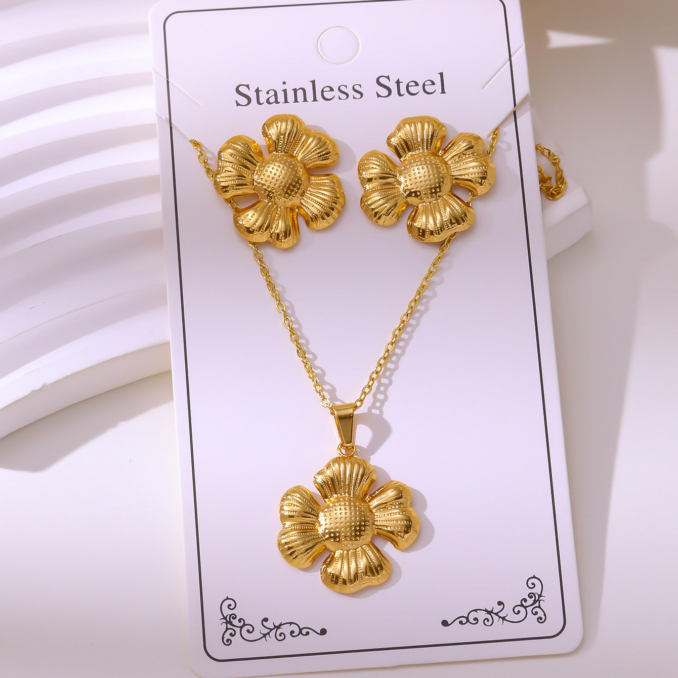 Set de collar + aretes flores - acero inoxidable
