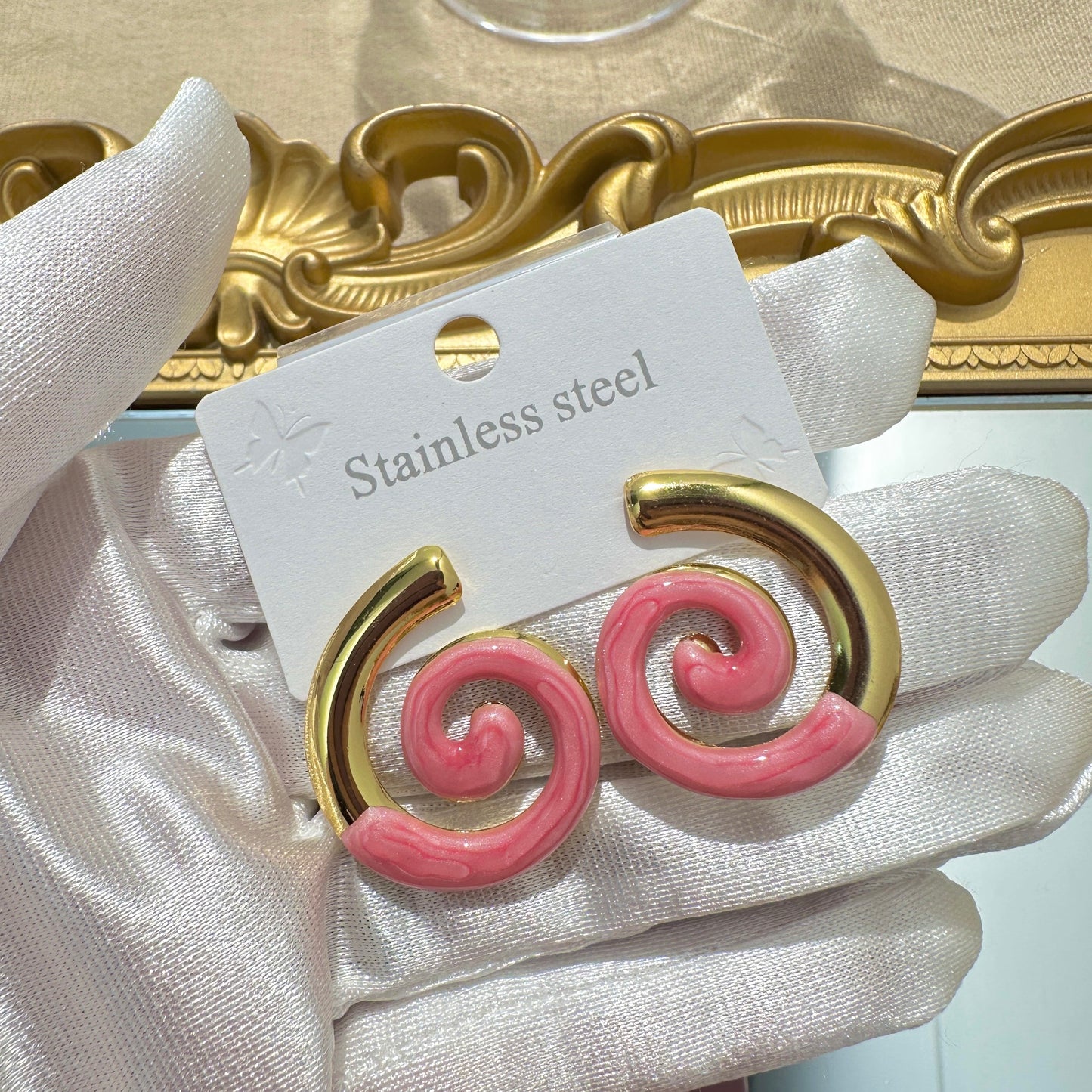Aretes espiral rosa - acero inoxidable