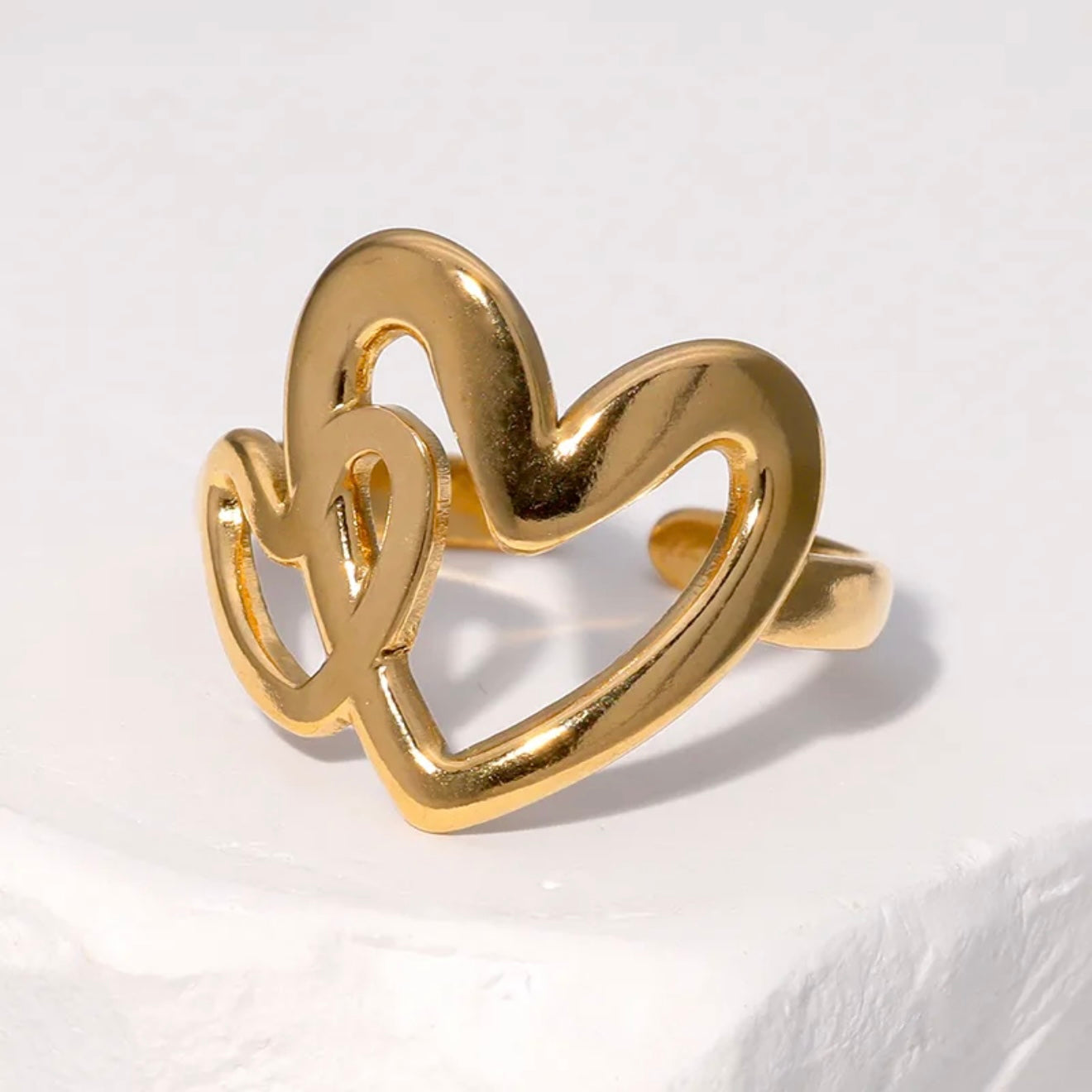 Anillo ajustable dos corazones dorado / Acero inoxidable