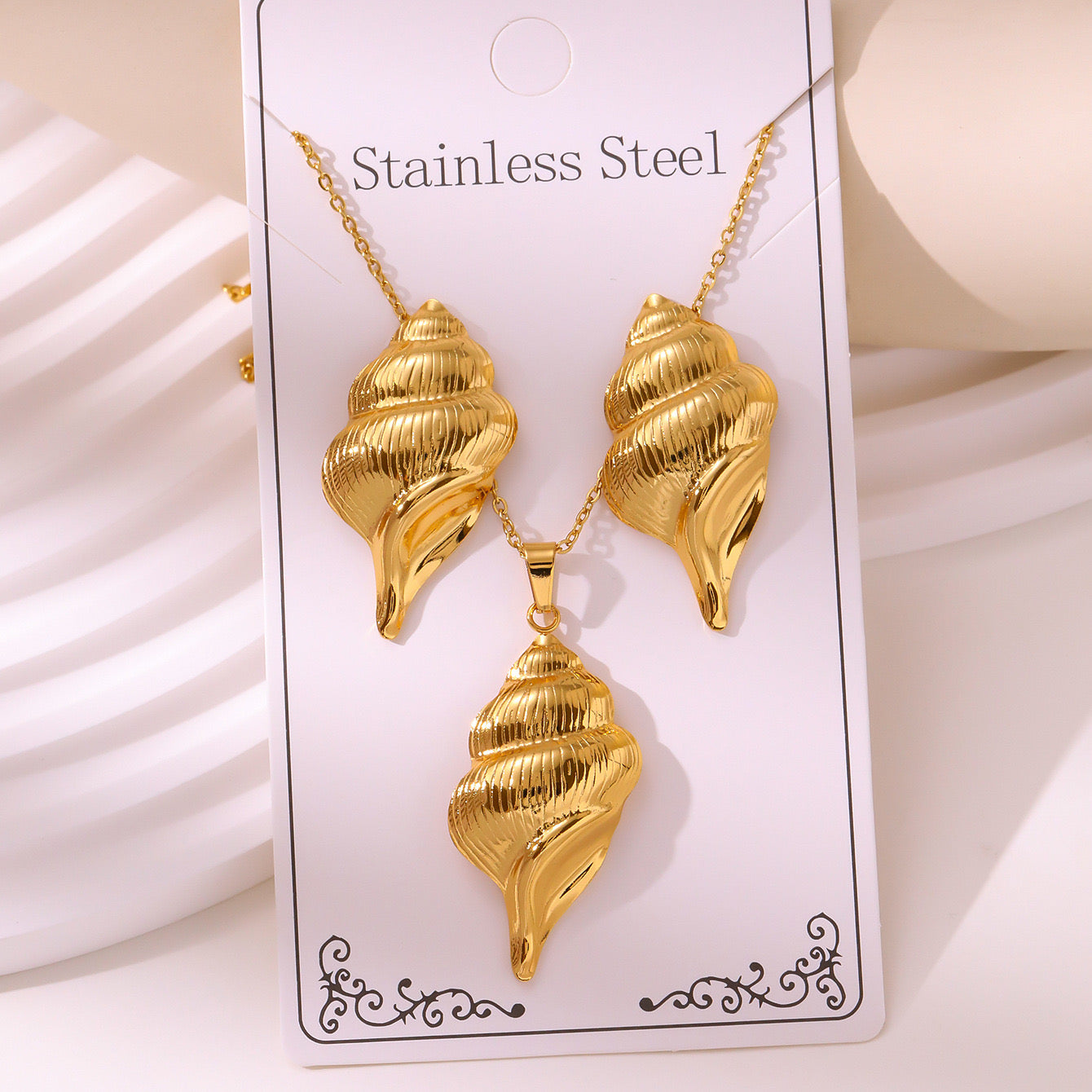 Set de collar + aretes caracol - acero inoxidable
