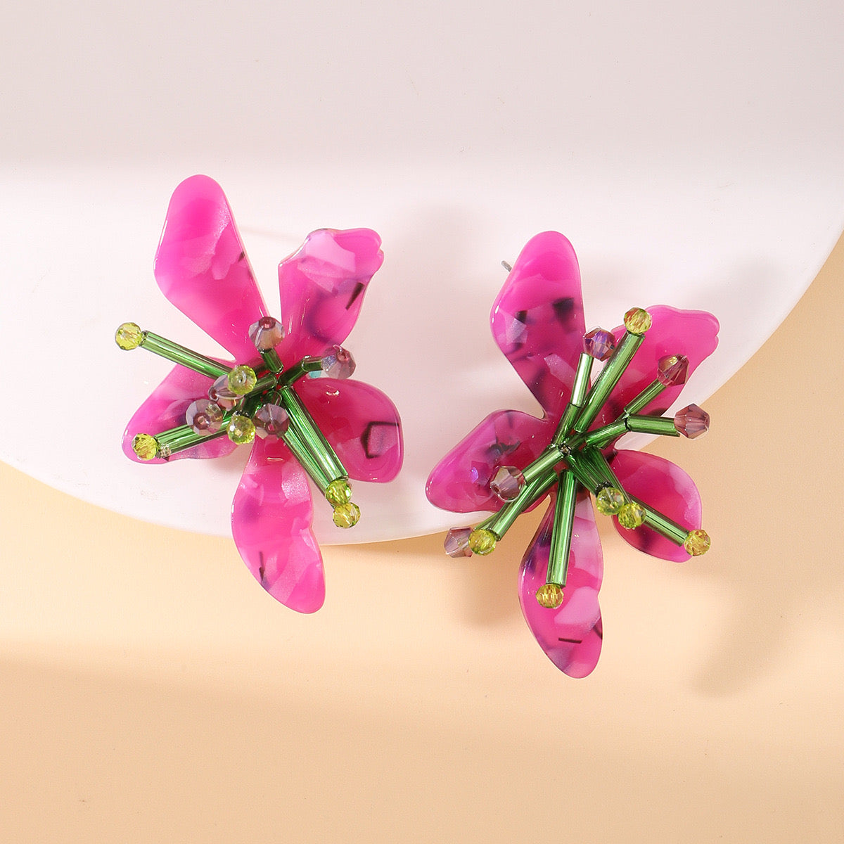 Aretes de flores moradas