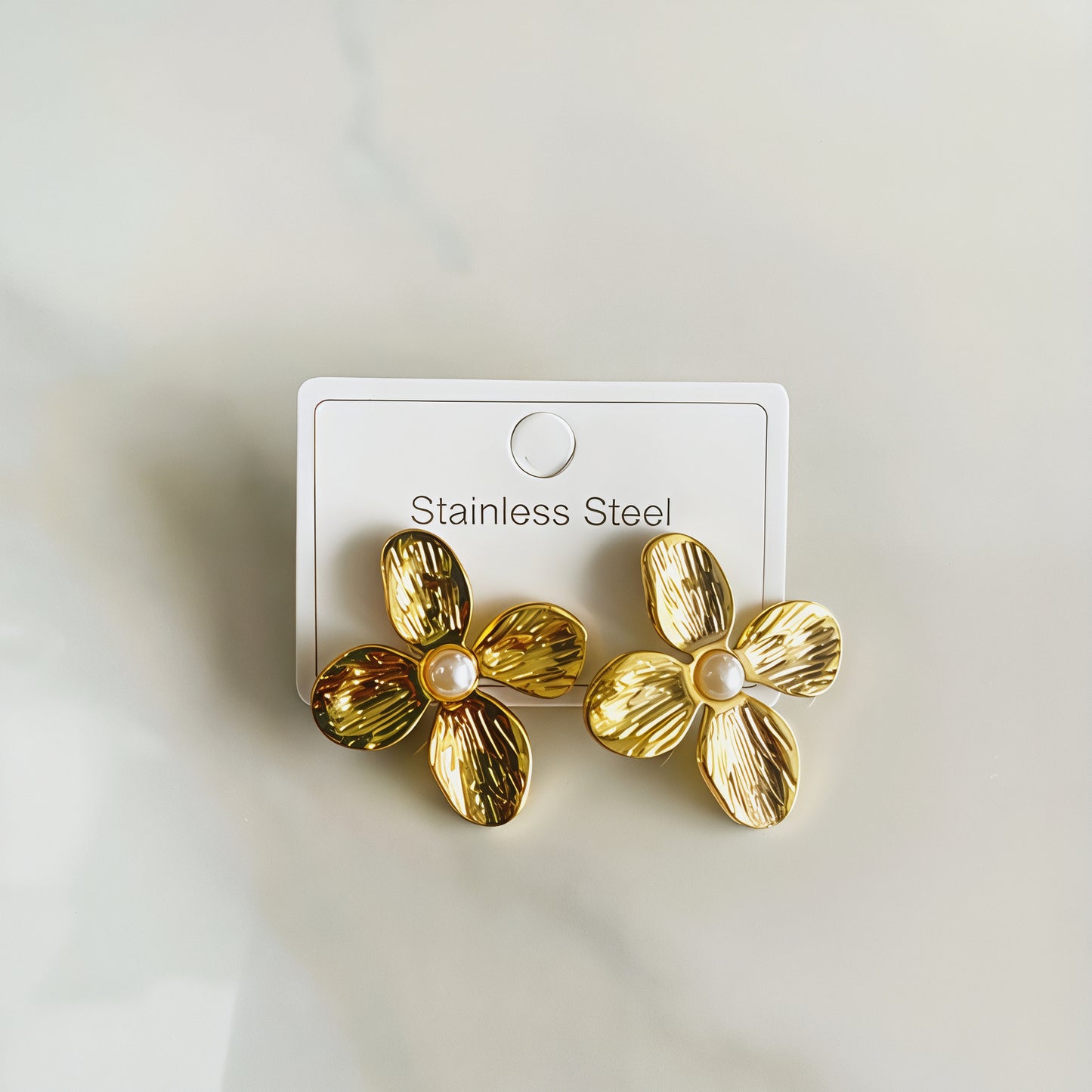 Aretes flores doradas- acero inoxidable