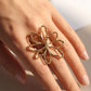 Anillo ajustable flor dorada - acero inoxidable