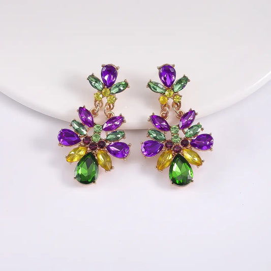 Aretes de pedrería morada y verde