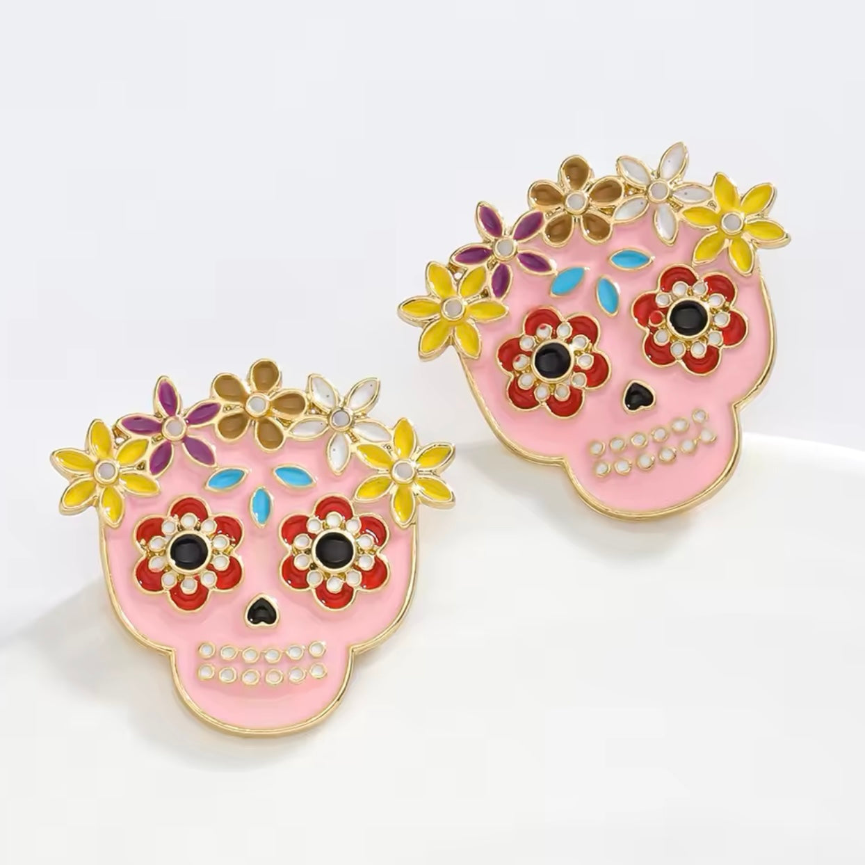 Aretes calaveritas rosas