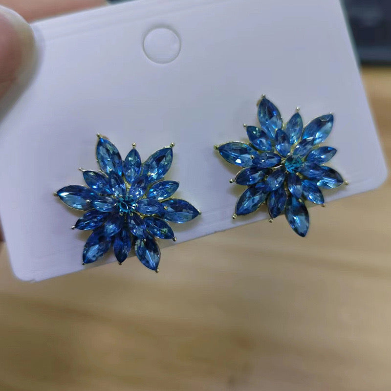 Aretes de copos de nieve-azules