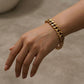 Pulsera de cadena dorada