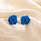 Aretes de flores azules