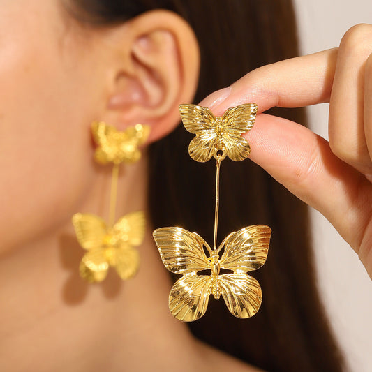 Aretes largos dorados - mariposas