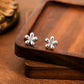Aretes florecitas plateadas- acero inoxidable