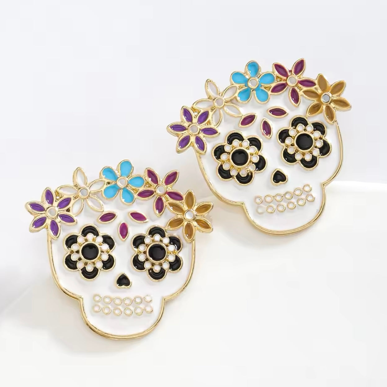 Aretes calaveritas blancas