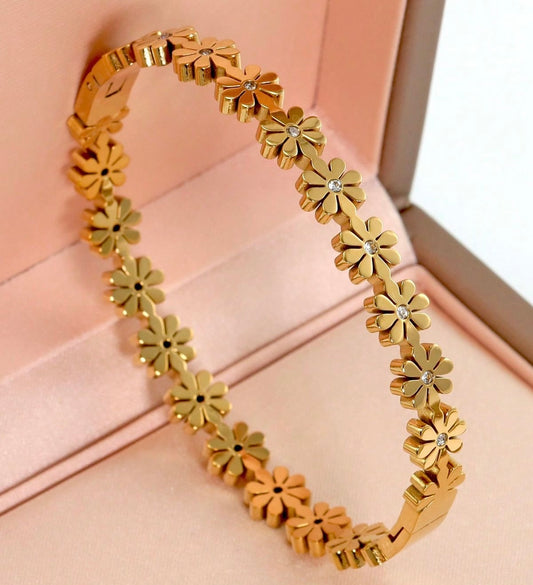 Brazalete de flores doradas - acero inoxidable