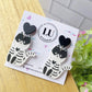 Aretes gatitos esqueleto