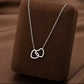 Collar de corazones entrelazados - acero inoxidable