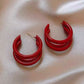 Aretes triple aro rojos
