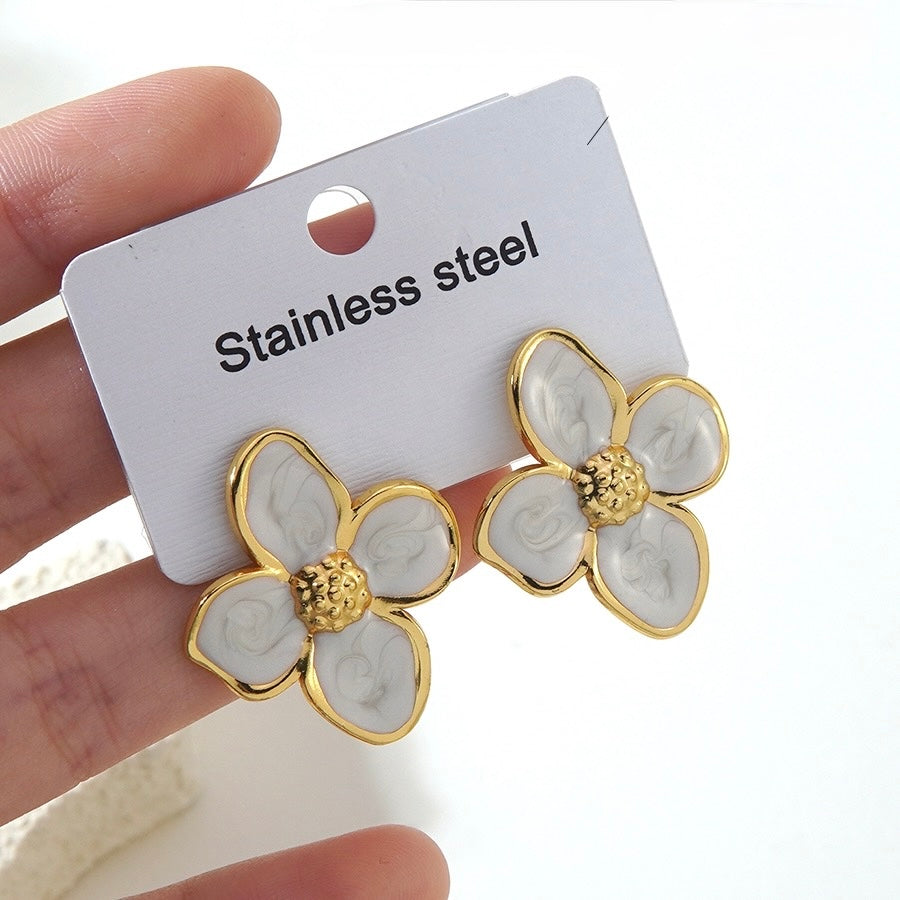 Aretes flores blancas- acero inoxidable