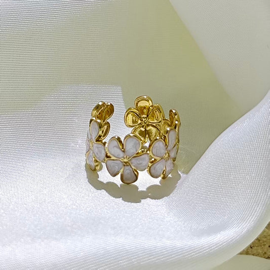 Anillo ajustable flores blancas - acero inoxidable