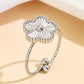 Anillo ajustable de flor plateada- acero inoxidable