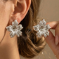 Aretes de flores plateadas- acero inoxidable