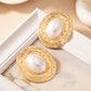 Aretes grandes redondos dorados
