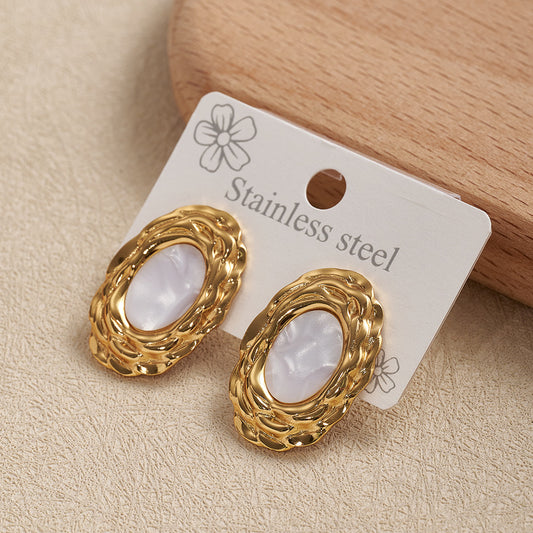 Aretes ovalados dorado y blanco - acero inoxidable
