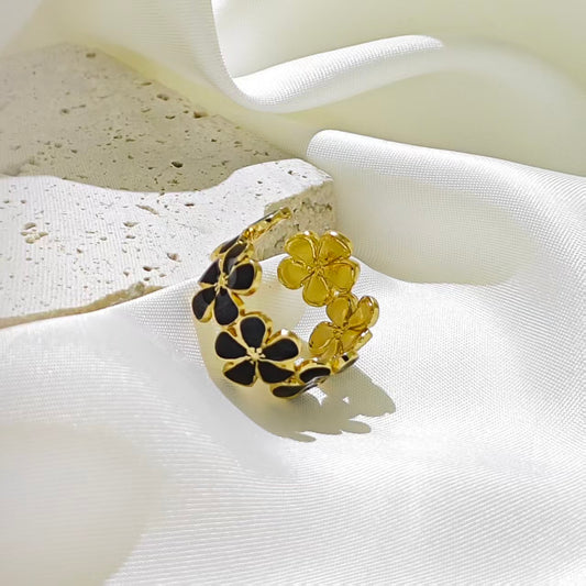 Anillo ajustable flores negras- acero inoxidable