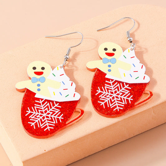 Aretes taza con galleta navideña