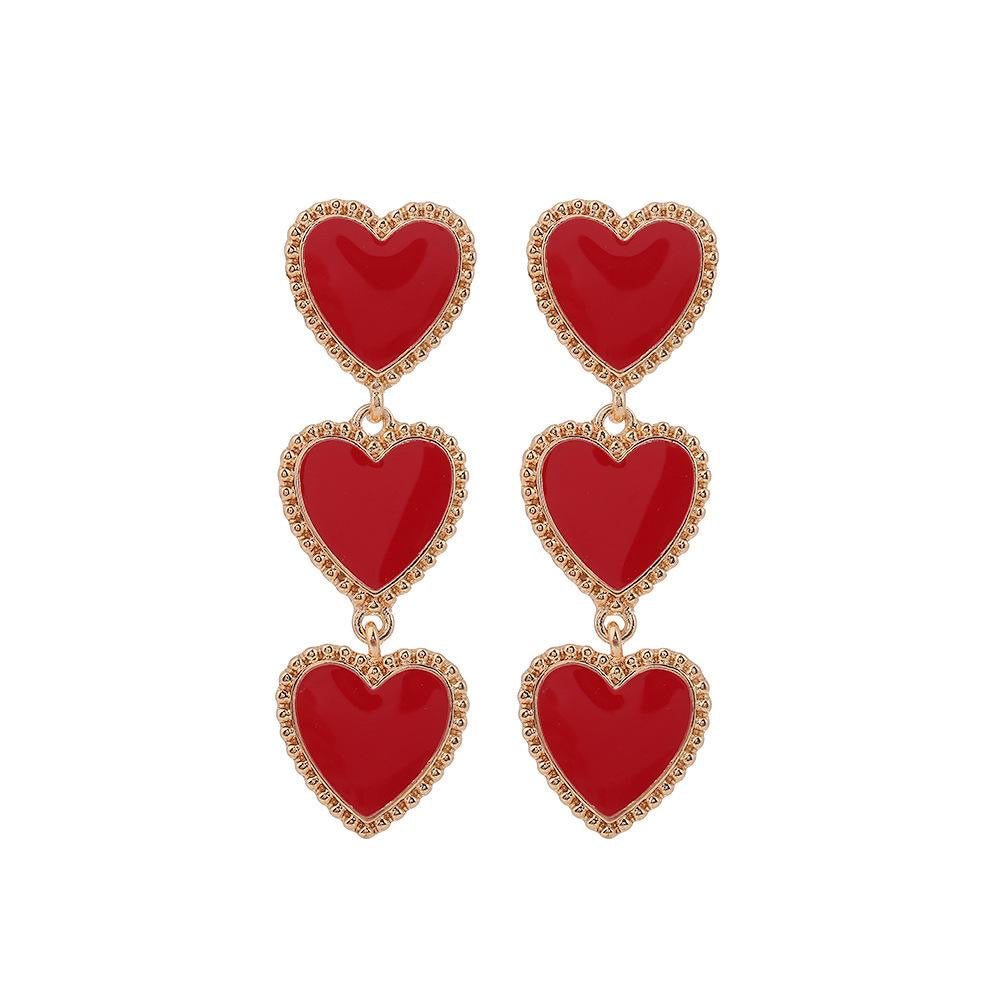 Aretes largos corazones rojos