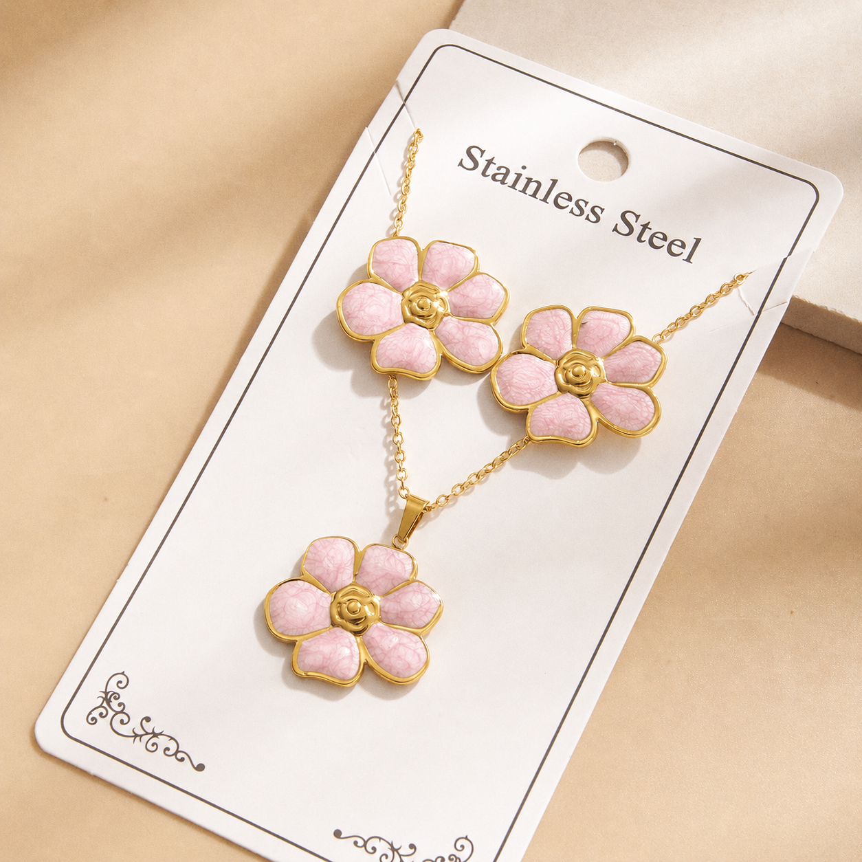 Set de collar + aretes flores rosadas- acero inoxidable