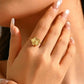 Anillo ajustable de flor dorada - acero inoxidable