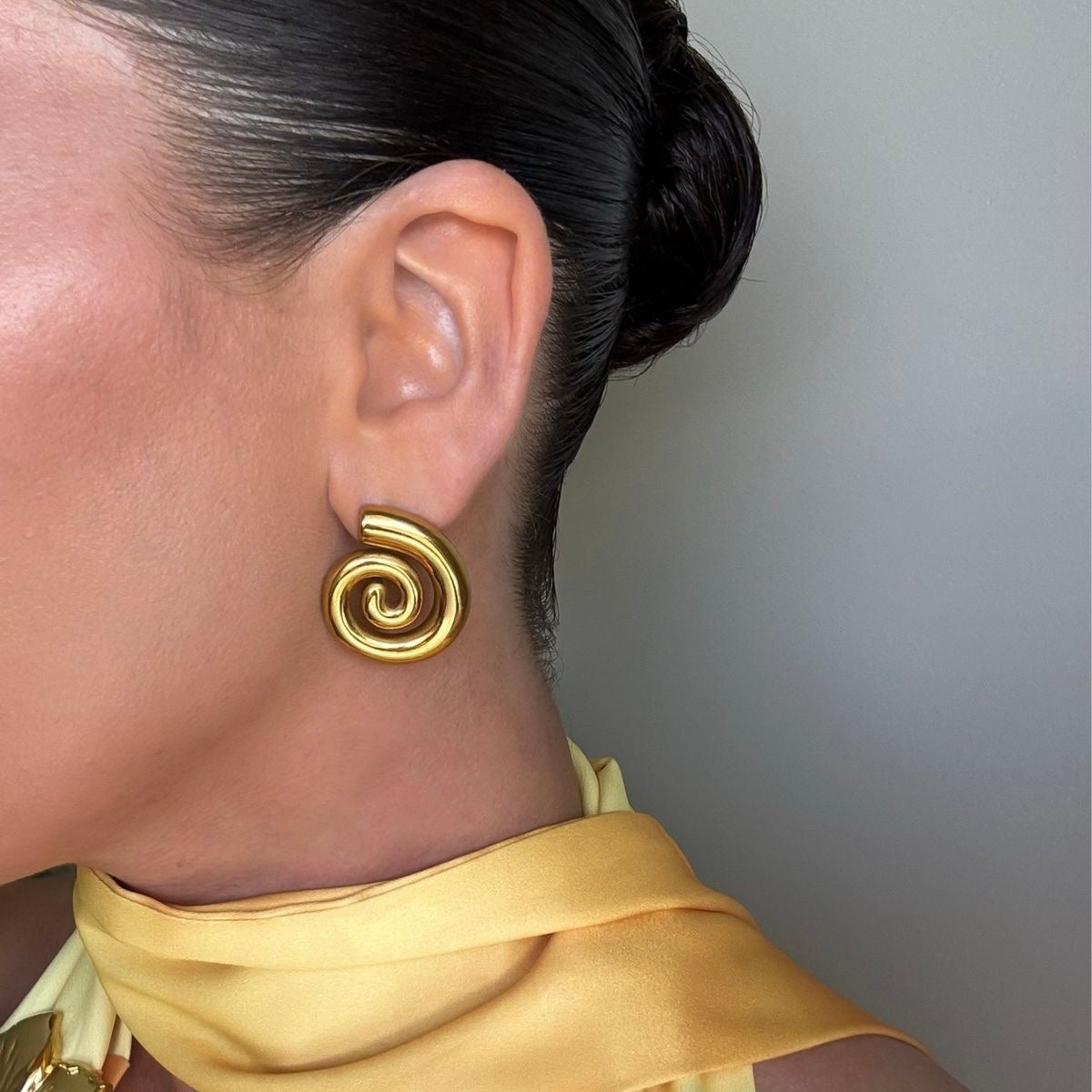 Aretes espiral dorados - acero inoxidable