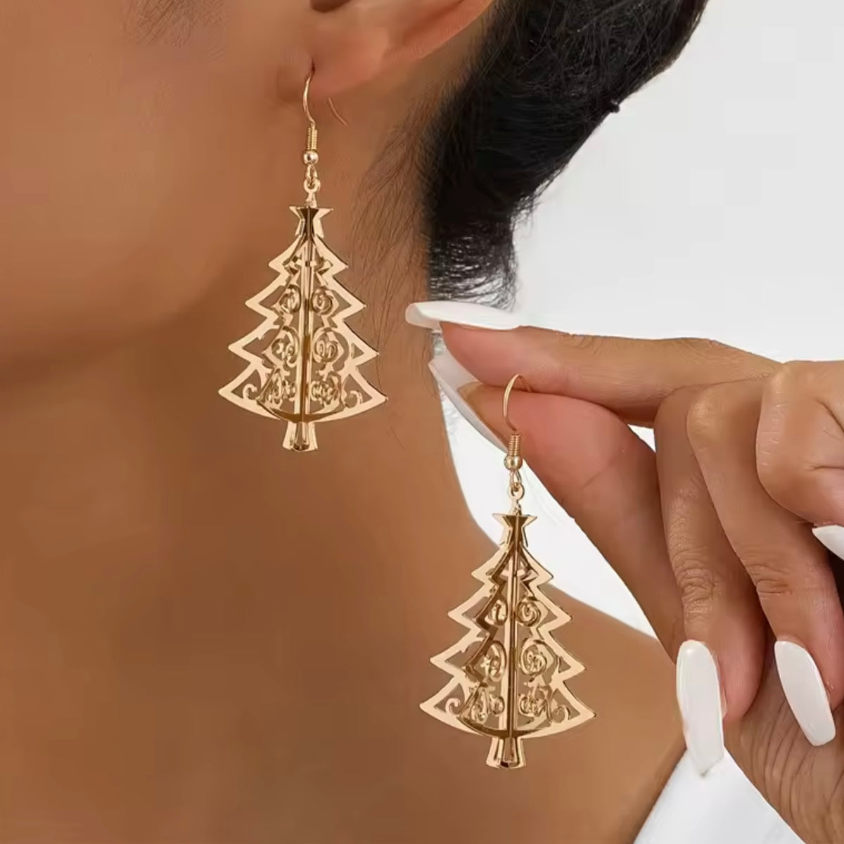 Aretes de arbolitos dorados