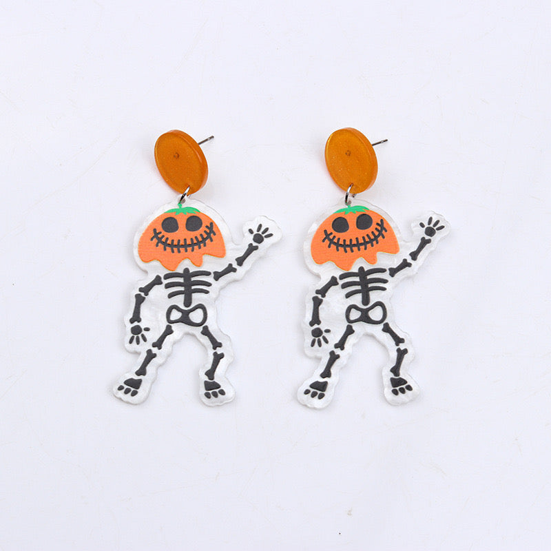 Aretes de calabazas con esqueleto