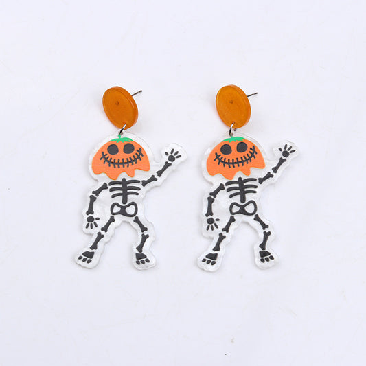 Aretes de calabazas con esqueleto