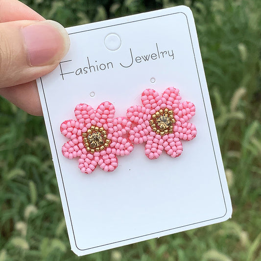 Aretes de flores rosadas